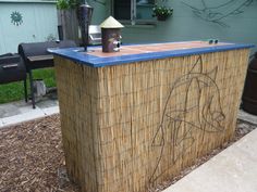Tiki Bar made from a carpenters table. 